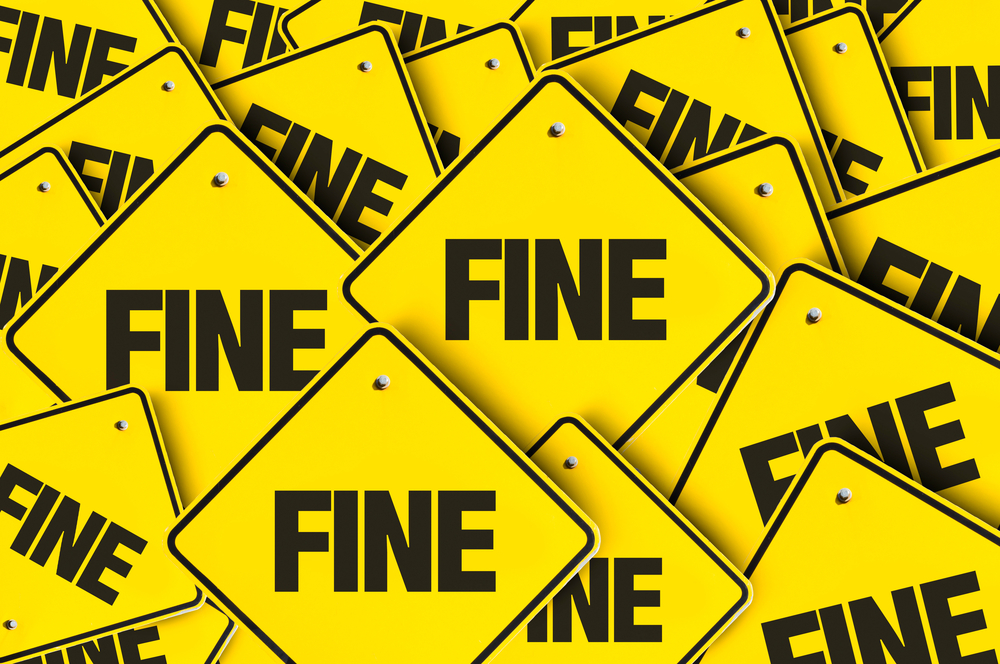 yellow signs reading fine