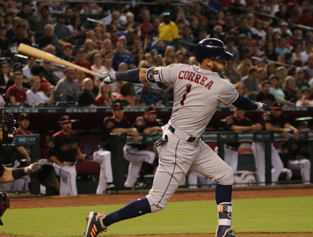 Houston Astros player hitting the ball