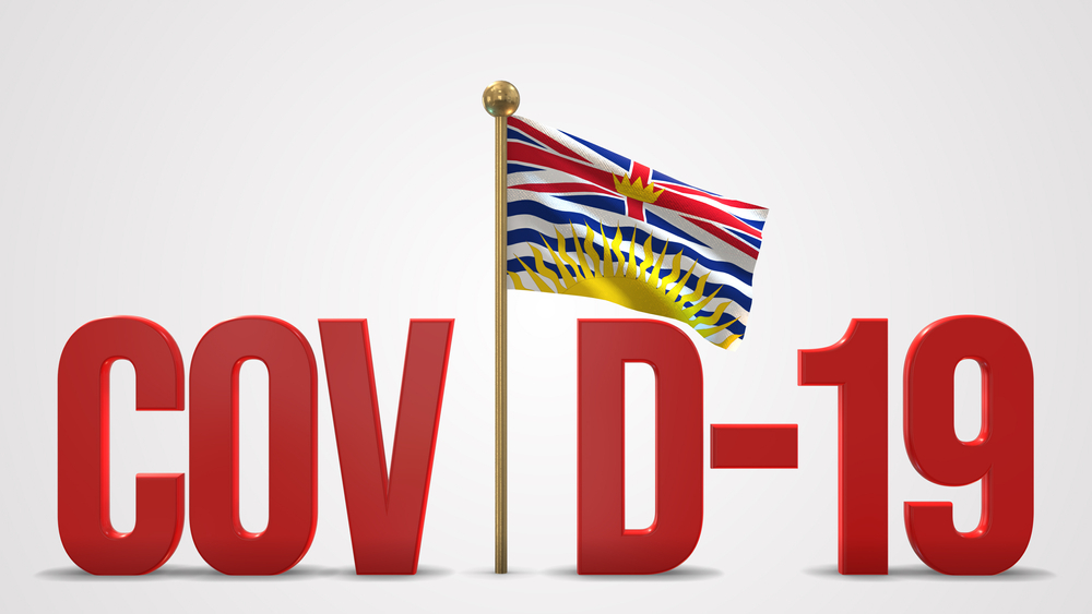 British Columbia flag with COVID-19 lettering